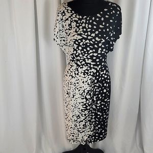 White House Black Market Size 6 Black and white dress. Mid length.